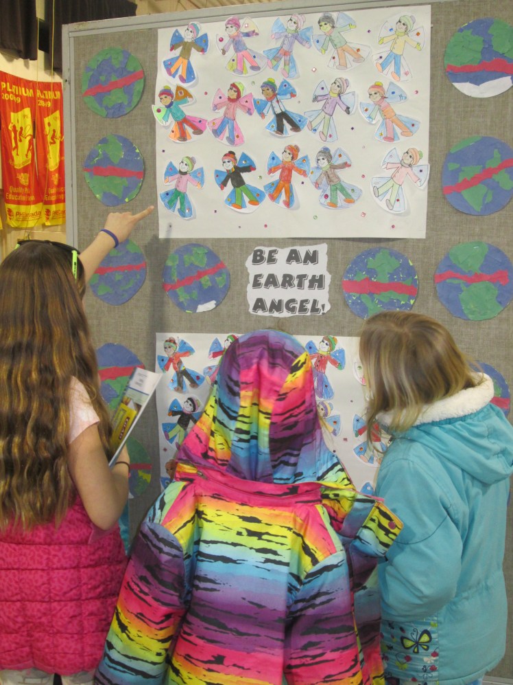 Tom Thomson students viewing the art on display