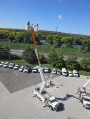 View from my bucket truck of another resident and Burlington Hydro employee.