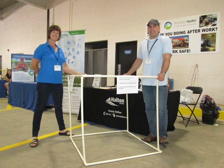 Kathy and John demonstrating what a cubic metre of water looks like.