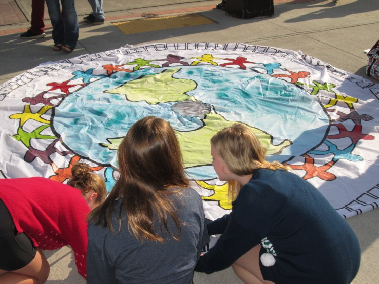 Students making pledge to protect environment during climate change student protest