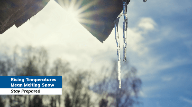 Image of melting icicles on the roof of a house with the text 'Rising temperatures mean melting snow. Stay prepared.'